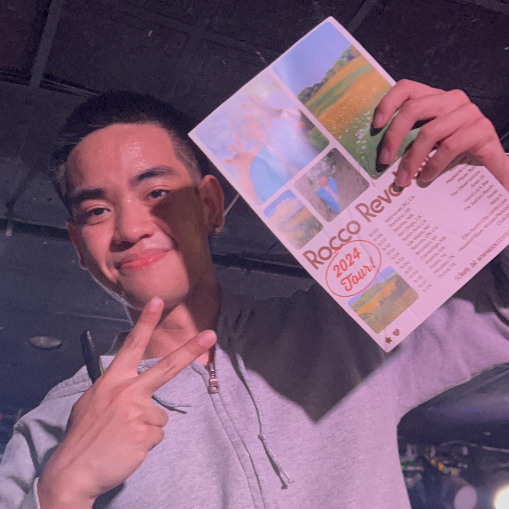 Rocco with my fanmade Rocco Revolution tour poster (he signed two of them!)